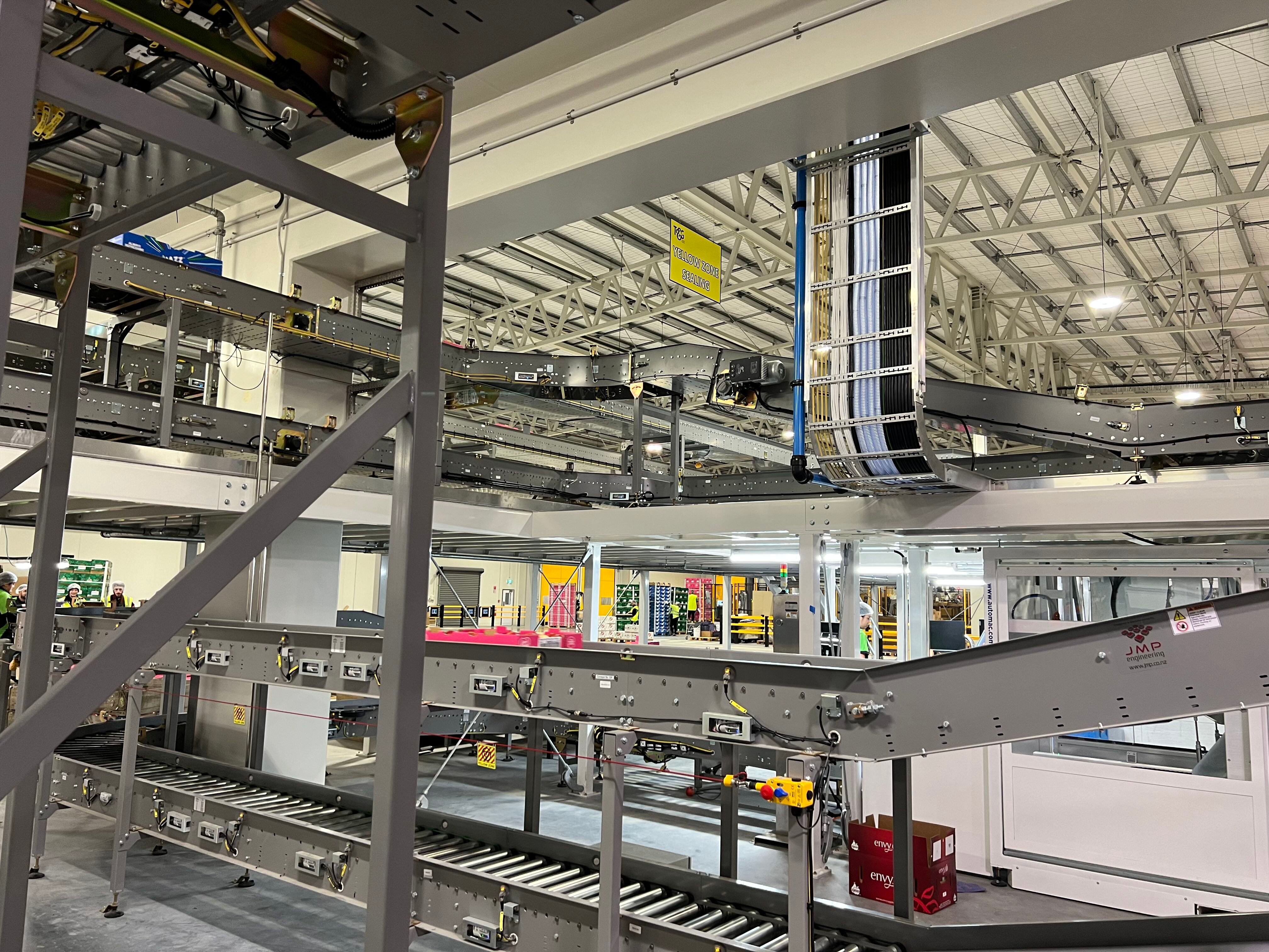industrial conveyor belts and support structures used in warehouse automation